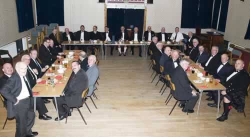 The Brethren sit down to eat The Brethren sit down to eat